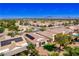 Aerial view showing neighborhood, solar panels, and a well-kept backyard at 2185 High Mesa Dr, Henderson, NV 89012