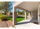 Backyard with a patio featuring chairs and manicured garden beds at 2185 High Mesa Dr, Henderson, NV 89012