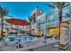 Charming outdoor dining area by the splash pad, perfect for enjoying the vibrant atmosphere and community at 2185 High Mesa Dr, Henderson, NV 89012