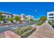 Inviting street view with well-manicured landscaping, providing a charming and welcoming atmosphere at 2185 High Mesa Dr, Henderson, NV 89012