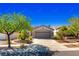 Charming single-story home with well-manicured landscaping and a two-car garage at 2185 High Mesa Dr, Henderson, NV 89012