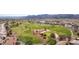 Aerial view of a lush green golf course on a sunny day at 2185 High Mesa Dr, Henderson, NV 89012
