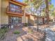 Exterior of the home featuring a small second story outdoor porch at 2462 Pickwick Dr, Henderson, NV 89014