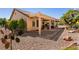 The backyard has decorative rock landscaping and a covered patio perfect for outdoor entertaining at 2521 Roseworthy Dr, Las Vegas, NV 89134