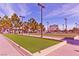 A well maintained bocce ball court on a sunny day at 2521 Roseworthy Dr, Las Vegas, NV 89134