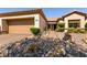 Charming single-story home featuring a well-manicured rock garden and a cozy, inviting entrance walkway at 2521 Roseworthy Dr, Las Vegas, NV 89134