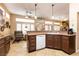 Spacious kitchen features an open floor plan, tile floors, and breakfast bar seating at 2521 Roseworthy Dr, Las Vegas, NV 89134