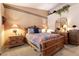 Primary bedroom featuring carpet floors, bay window, and traditional style furniture at 2521 Roseworthy Dr, Las Vegas, NV 89134