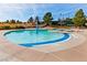 Community pool featuring a shallow end with blue accents on a sunny day at 2521 Roseworthy Dr, Las Vegas, NV 89134