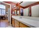 Bathroom featuring a long white countertop and a view of the adjacent office at 2543 Farmington Ave, Las Vegas, NV 89120