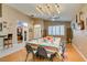 Open dining area features wood floors, easy access to the kitchen, and stylish decor at 2543 Farmington Ave, Las Vegas, NV 89120