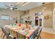 Bright dining area features tile and wood floors with easy access to other rooms in the house at 2543 Farmington Ave, Las Vegas, NV 89120