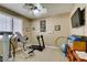 Home exercise room with essential equipment and a ceiling fan for ventilation at 2543 Farmington Ave, Las Vegas, NV 89120