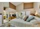 Spacious main bedroom boasts high ceilings, neutral tones, and comfortable bedding at 2543 Farmington Ave, Las Vegas, NV 89120