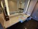Elegant bathroom with a soaking tub, modern vanity, large mirror, and sleek fixtures at 2600 W Harmon Ave # 20034, Las Vegas, NV 89158