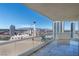 This condo's balcony showcases a panoramic city view, with glass railings and tile floors offering a luxurious experience at 2777 Paradise Rd # 2605, Las Vegas, NV 89109