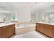 Bathroom with a large soaking tub, vanity and marble countertop at 2777 Paradise Rd # 2605, Las Vegas, NV 89109