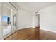 Bright bedroom with hardwood floors and access to a private balcony at 2777 Paradise Rd # 2605, Las Vegas, NV 89109