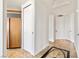 Hallway featuring tile flooring, neutral walls, and a storage closet at 2777 Paradise Rd # 2605, Las Vegas, NV 89109