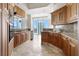 Well-equipped kitchen with custom cabinets, granite countertops, and an amazing city view at 2777 Paradise Rd # 2605, Las Vegas, NV 89109