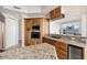 Elegant kitchen boasts custom cabinets, granite countertops, and top-of-the-line appliances at 2777 Paradise Rd # 2605, Las Vegas, NV 89109