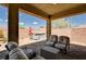 Inviting covered patio with comfortable seating and a relaxing hot tub, perfect for outdoor entertaining at 2902 Ventana Ridge Ave, Henderson, NV 89044
