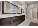 The bathroom features a dual sink, modern vanity, and an adjacent door to the closet at 2902 Ventana Ridge Ave, Henderson, NV 89044