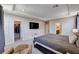 This bedroom features carpet floors, neutral-painted walls, and a walk-in closet at 2902 Ventana Ridge Ave, Henderson, NV 89044
