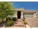Inviting single-story home with landscaped front yard and a two car garage at 2902 Ventana Ridge Ave, Henderson, NV 89044