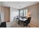 Home office features carpet floors, a desk and an abundance of natural light at 2902 Ventana Ridge Ave, Henderson, NV 89044