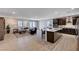 Open-concept living space featuring a modern kitchen, spacious living area and plenty of natural light at 2902 Ventana Ridge Ave, Henderson, NV 89044