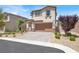 Charming home with a manicured yard, paved driveway, and a two-car garage at 3002 Coveri Ct, Las Vegas, NV 89141