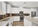 Modern kitchen featuring stainless steel appliances and ample counter space at 3002 Coveri Ct, Las Vegas, NV 89141