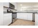 Kitchen with stainless steel oven and microwave with white cabinets at 3041 Gary Cooper St # 103, Las Vegas, NV 89122