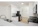 Modern kitchen with stainless steel appliances and sleek gray countertops at 3041 Gary Cooper St # 103, Las Vegas, NV 89122