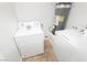 The laundry room features a washer, dryer, and utility closet with water heater at 3041 Gary Cooper St # 103, Las Vegas, NV 89122