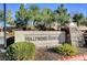 An eye-level view of the Hollywood Ranch community sign surrounded by manicured landscaping at 3041 Gary Cooper St # 103, Las Vegas, NV 89122