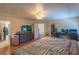 Spacious bedroom with walk-in closet, hardwood floors and a large bed at 3061 Brockington Dr, Las Vegas, NV 89120