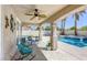 Covered patio offers a seating area overlooking the pool at 3064 Azure Bay St, Las Vegas, NV 89117
