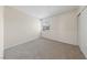 Spacious bedroom with new carpet, ample natural light, and a closet at 317 E Van Wagenen St, Henderson, NV 89015