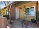 Inviting front entrance with a secure white door and well-maintained landscaping at 317 E Van Wagenen St, Henderson, NV 89015