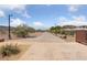 Street view of the neighborhood featuring walkway, desert landscaping, and green foliage at 317 E Van Wagenen St, Henderson, NV 89015