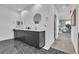 Bathroom with double vanity, sleek marble floors, and entry to the bedroom at 3206 Fountaintree Ave, Henderson, NV 89044