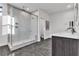 Modern bathroom features glass enclosed shower, vanity, and contemporary design at 3206 Fountaintree Ave, Henderson, NV 89044