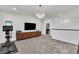 Bonus room with custom entertainment center, and an exercise bike at 3206 Fountaintree Ave, Henderson, NV 89044