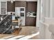 Kitchen featuring marble countertops, stainless steel appliances, and barstool seating at 3206 Fountaintree Ave, Henderson, NV 89044
