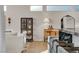 Stylish living space showcasing elegant decor, display cabinet, and marble countertop island at 3206 Fountaintree Ave, Henderson, NV 89044