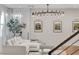 Bright living room with modern lighting, comfortable sofa and elegant decor at 3206 Fountaintree Ave, Henderson, NV 89044