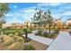 Community playground with lush landscaping and modern play structures, perfect for Gathering fun at 3206 Fountaintree Ave, Henderson, NV 89044