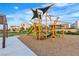 Community playground featuring modern play structures and colorful shade covers, designed for enjoyment at 3206 Fountaintree Ave, Henderson, NV 89044